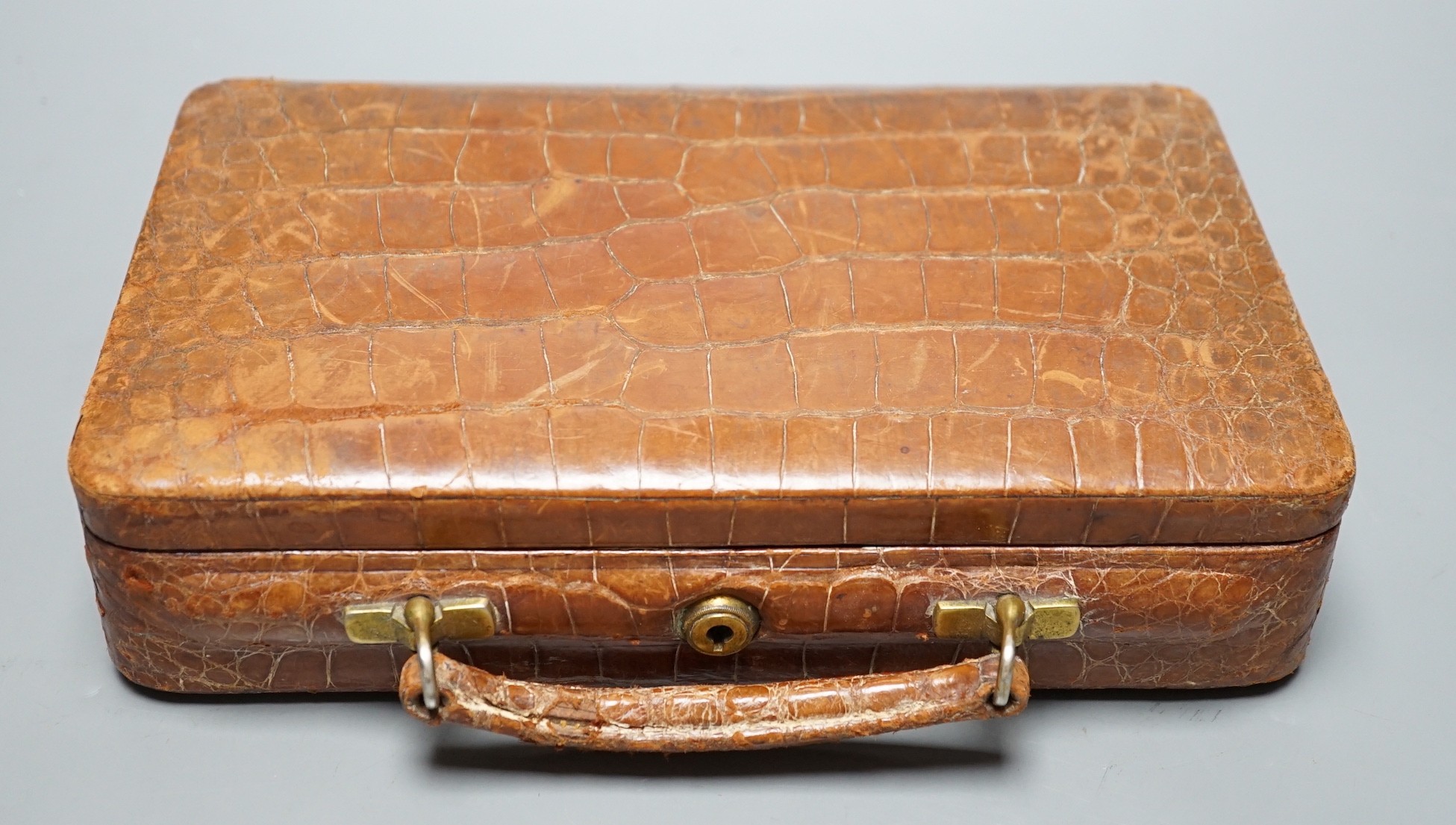 A pre-war Finnegans of Manchester crocodile skin jewellery case